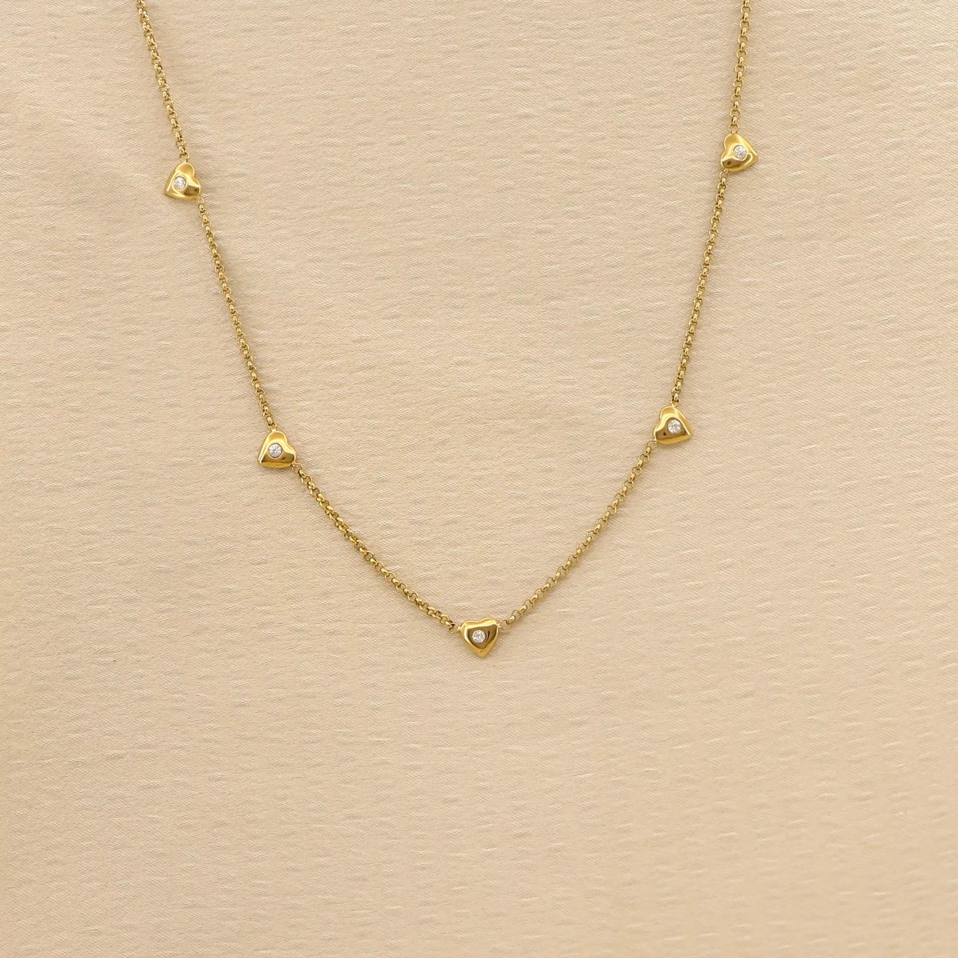 Nivra – 18K Gold Plated Heart Station Necklace